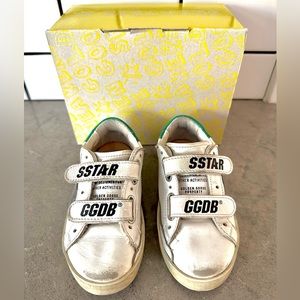 Golden Goose kids sneakers with leather upper stripes and heel suede star.